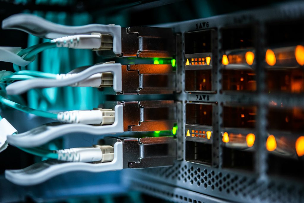 optical cables connected to the switch in data center